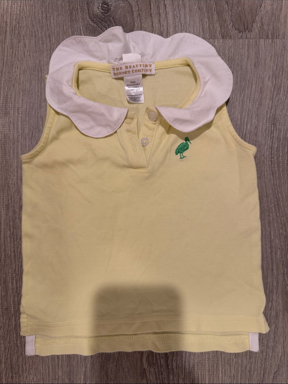 The Beaufort Bonnet Company Pale Yellow Sleeveless Polo with White Ruffle Collar